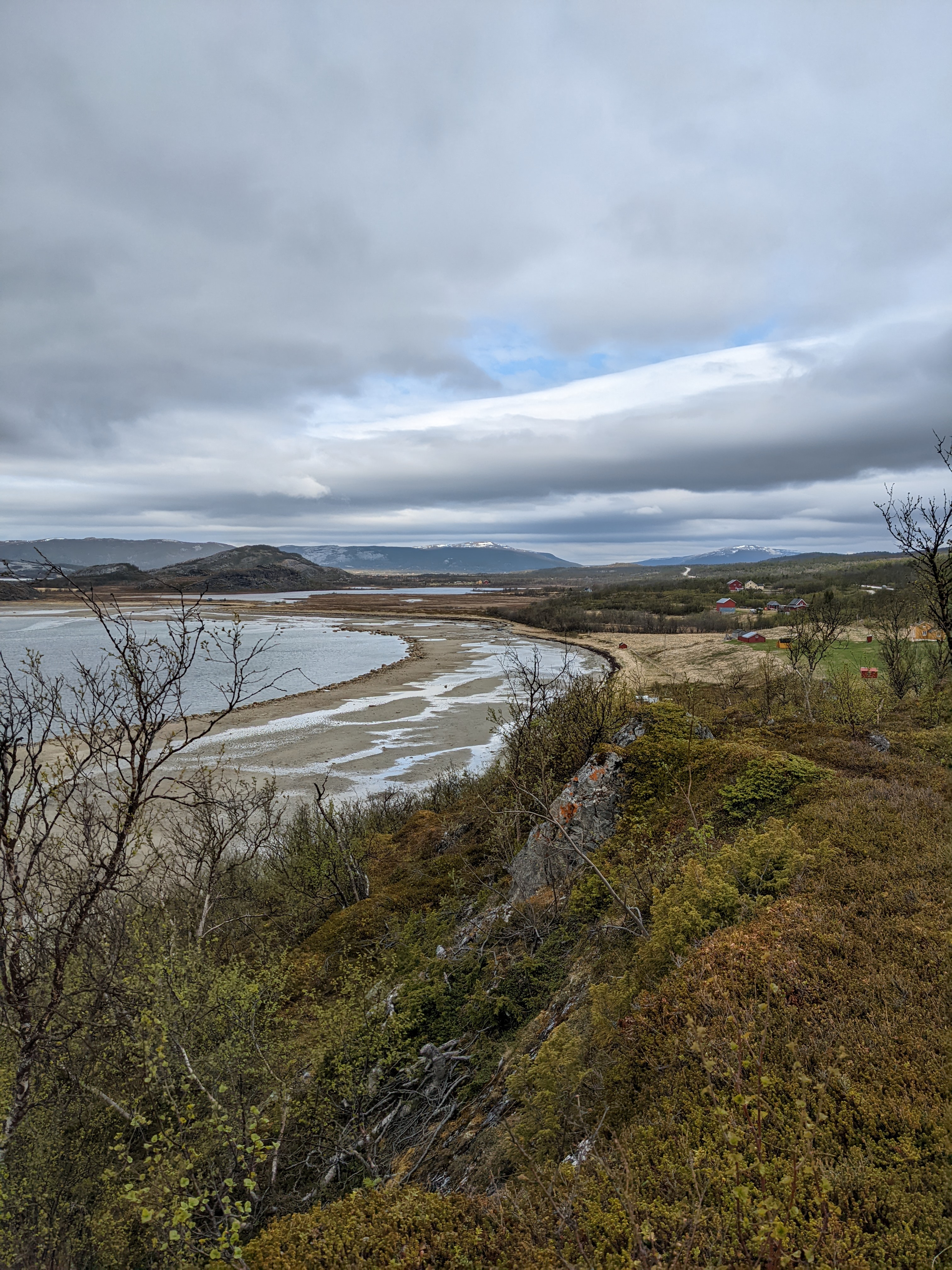 beach in low light seen from low cliff top