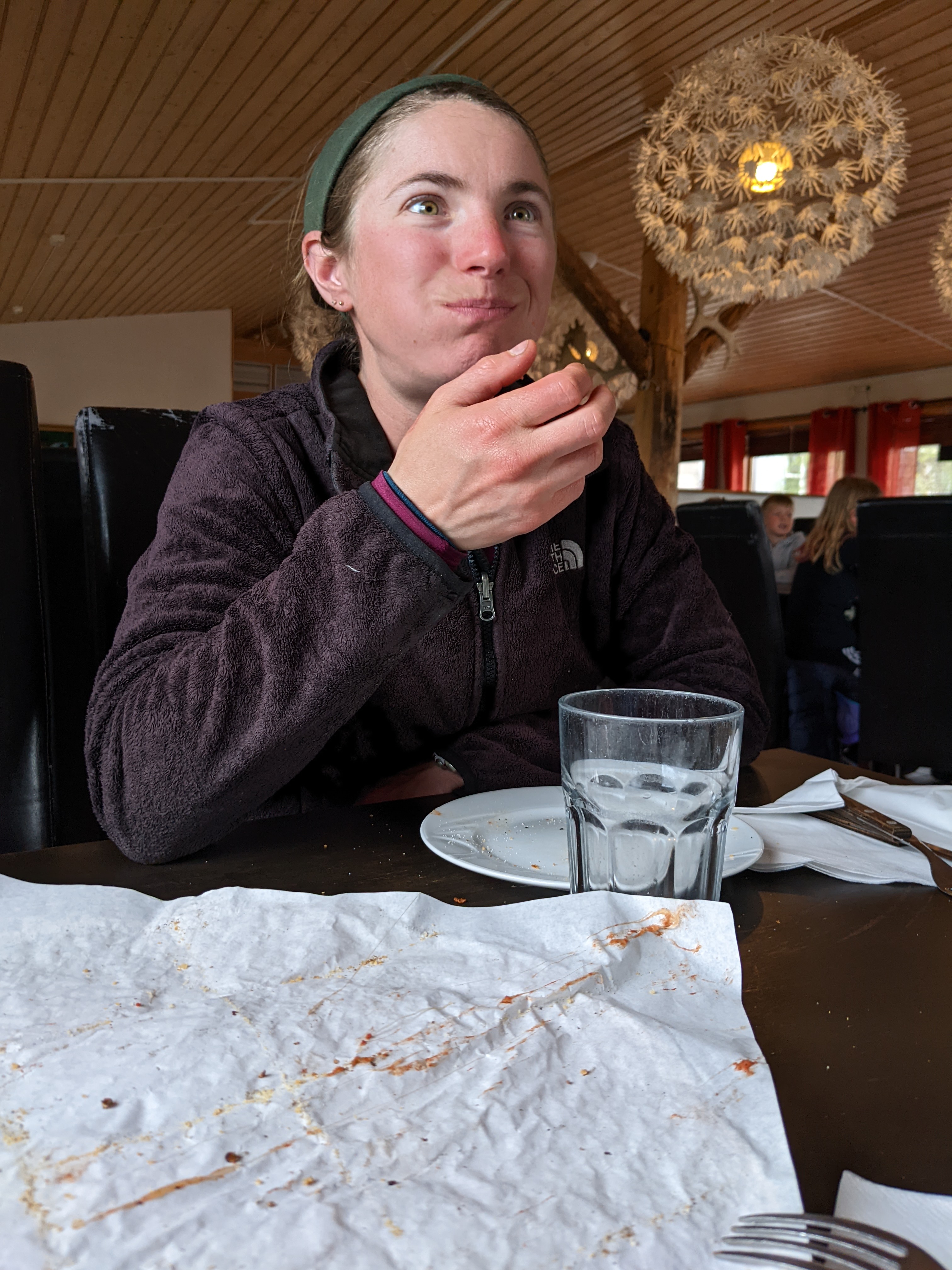 H looking surprised in front of an empty pizza tray