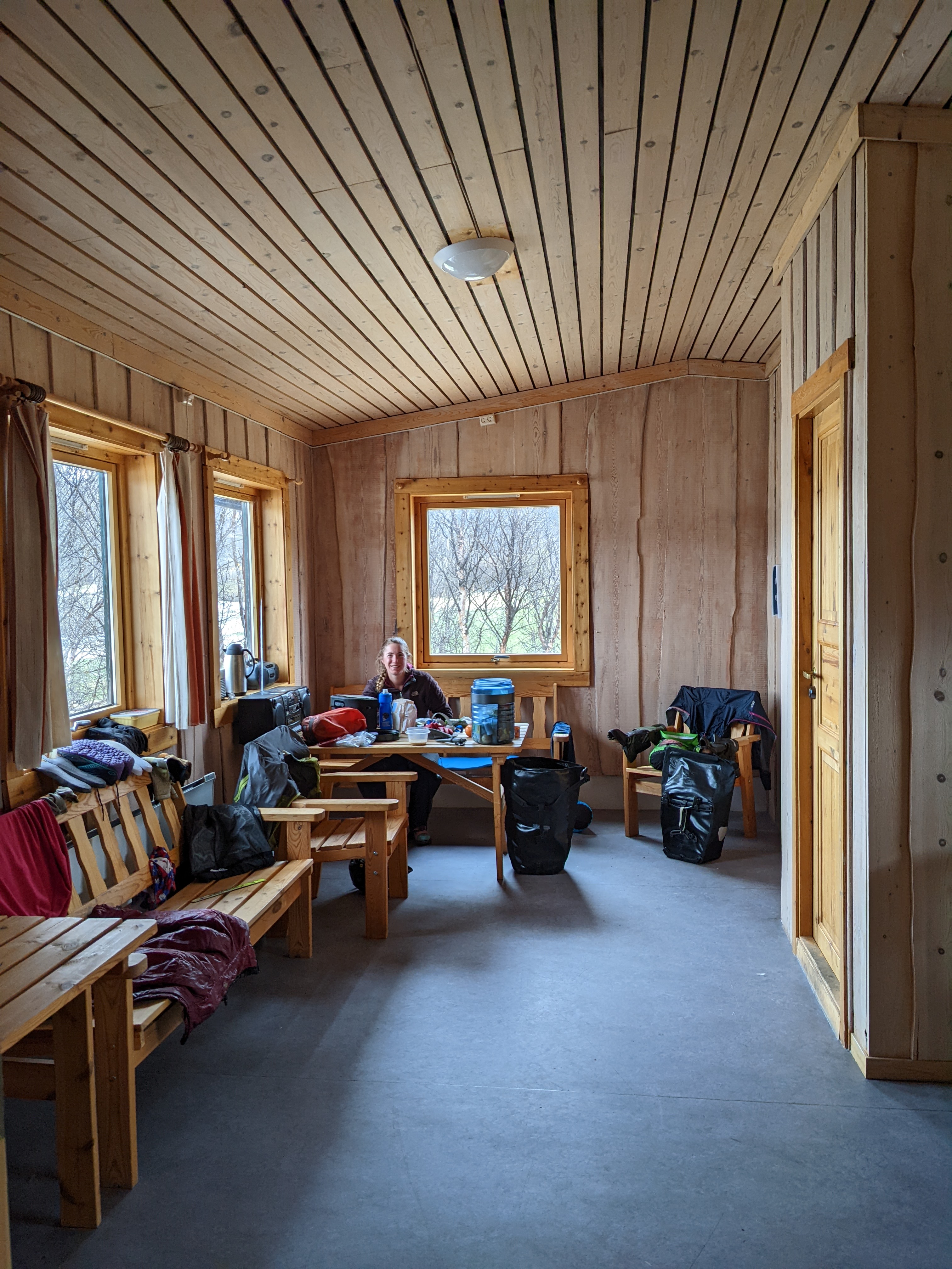 the public restroom and shelter at bekkarfjord's wood-paneled heated seating area