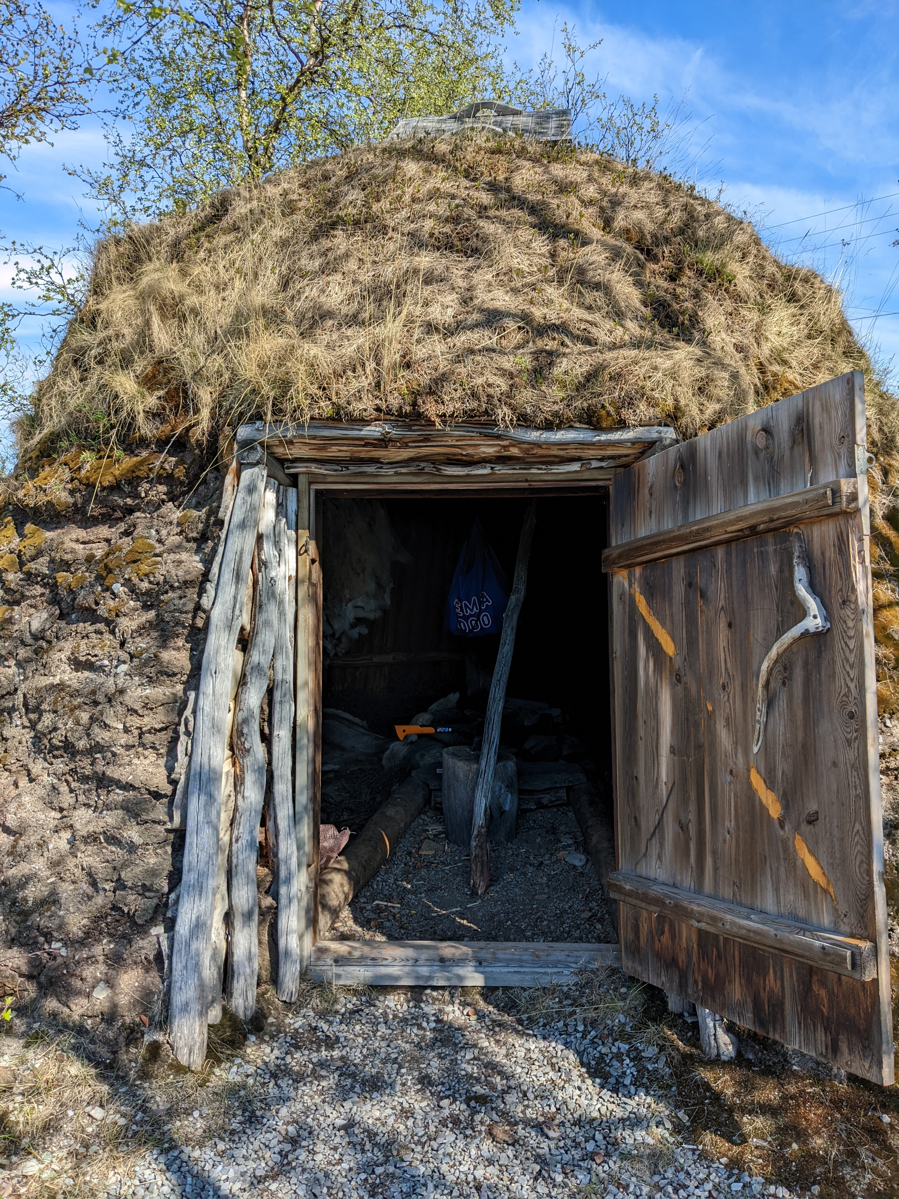 a traditional Sami earthen hut