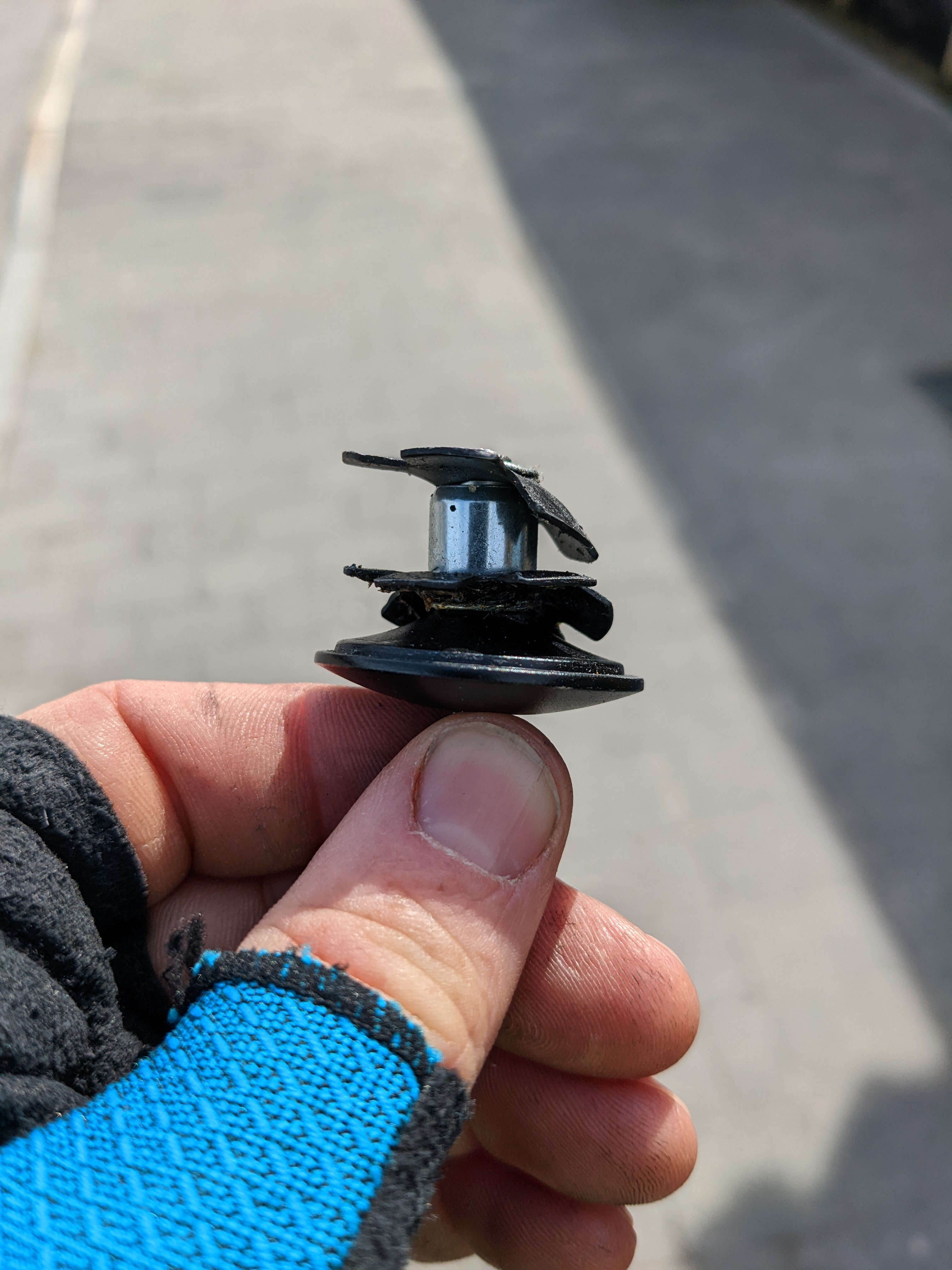 a bent star-fangled nut and headset cap