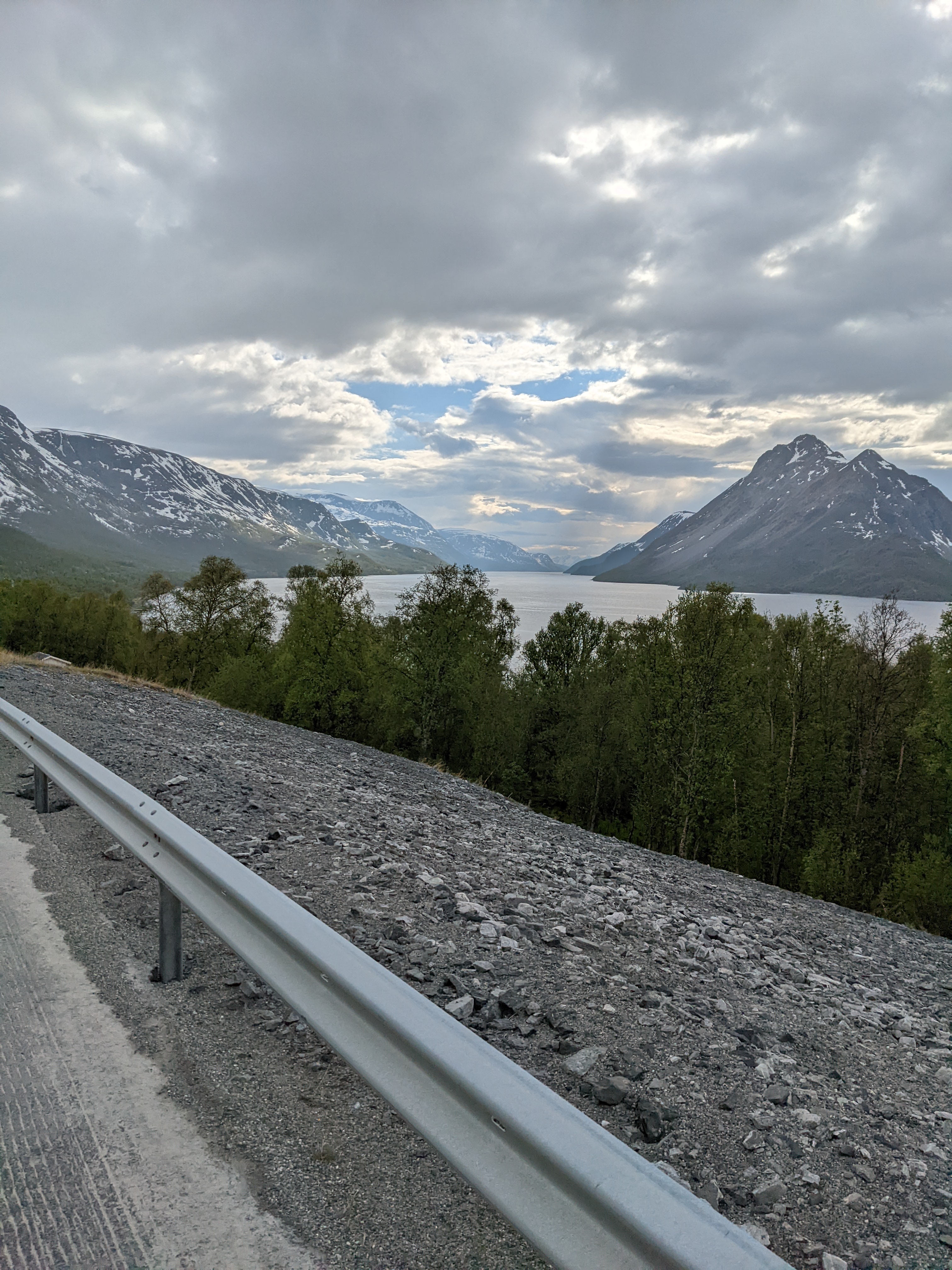 spotty dark clouds above the entrance to langfjord