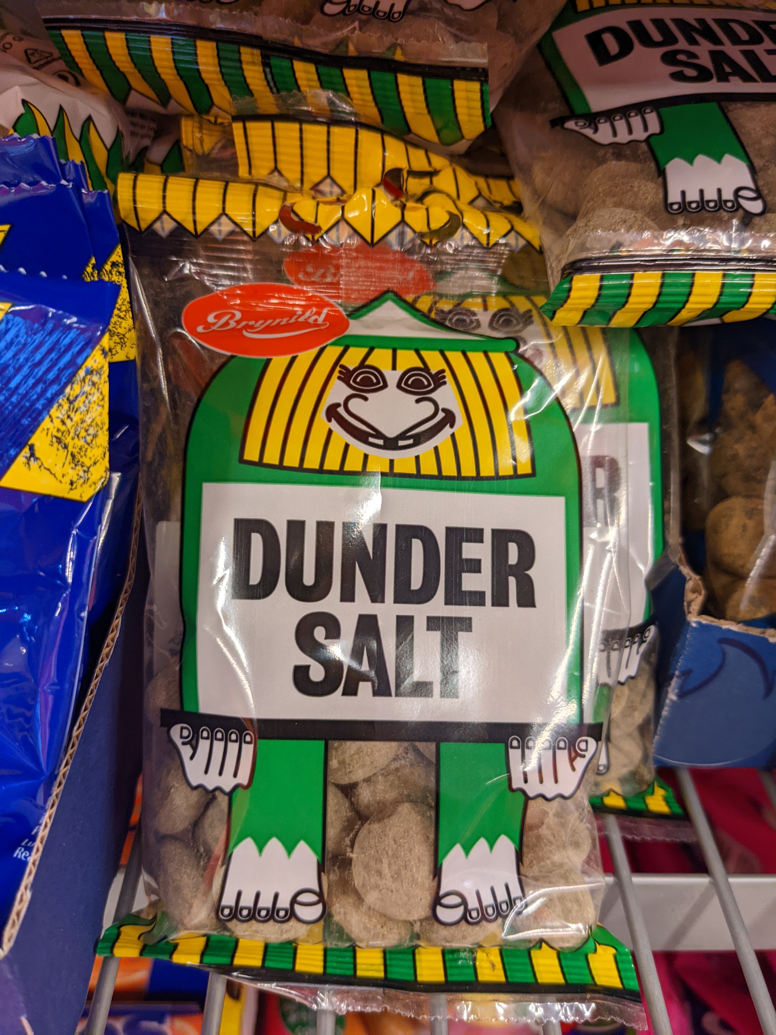 A bag of hard salmiak liquorice drops with a troll on them