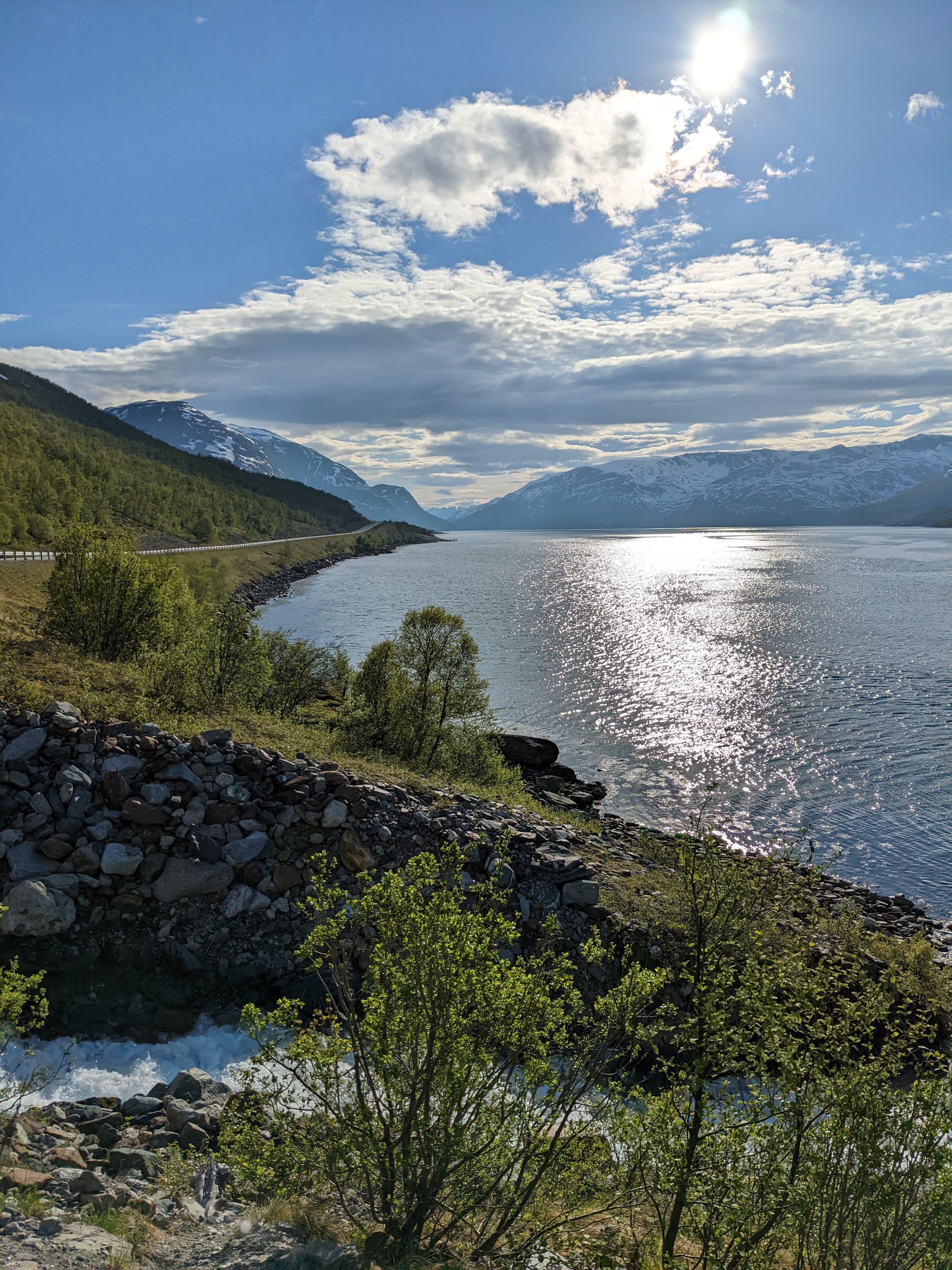 the outflow of a waterfall into the fjord