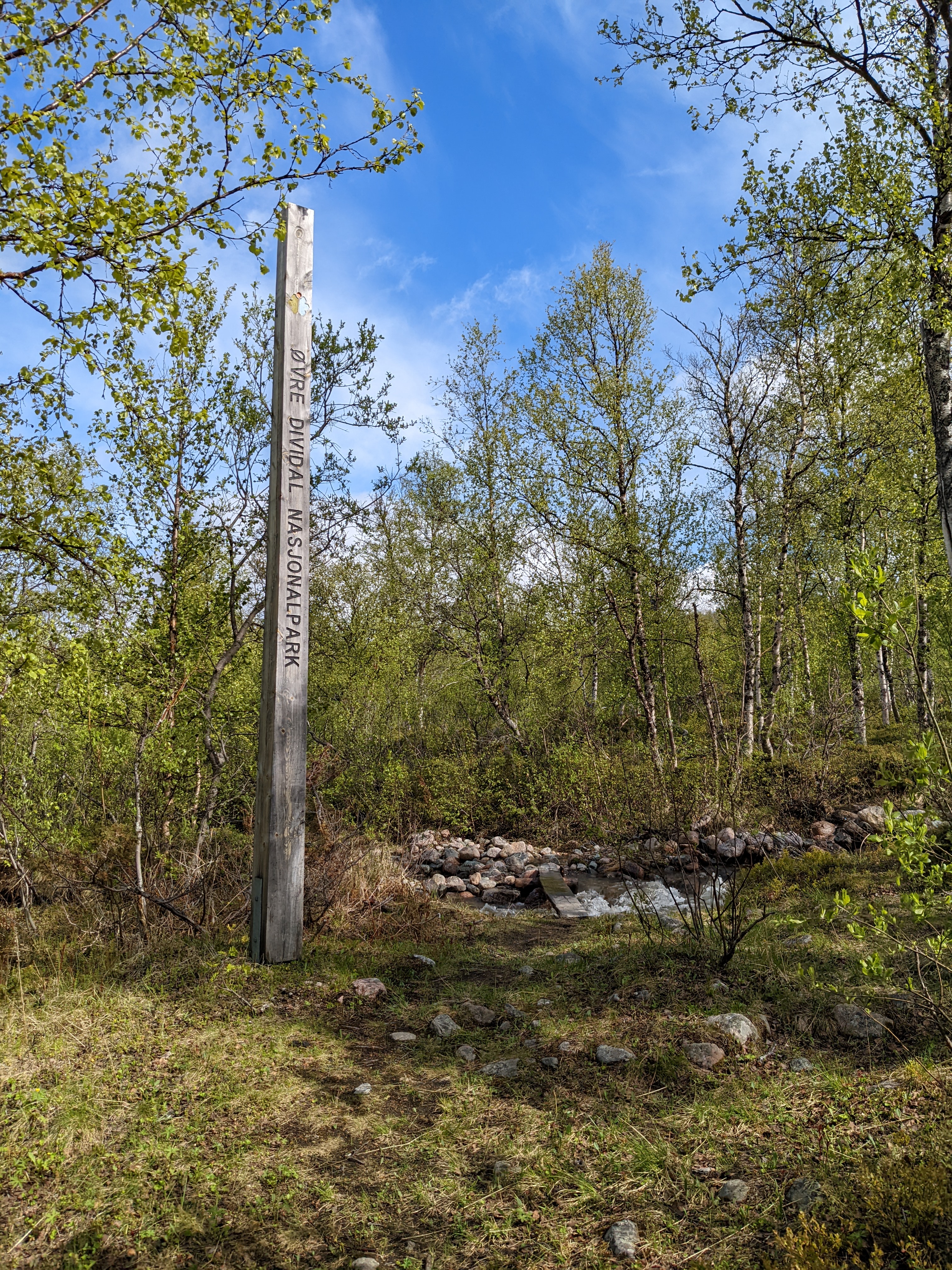 A signpost for the park along the trail