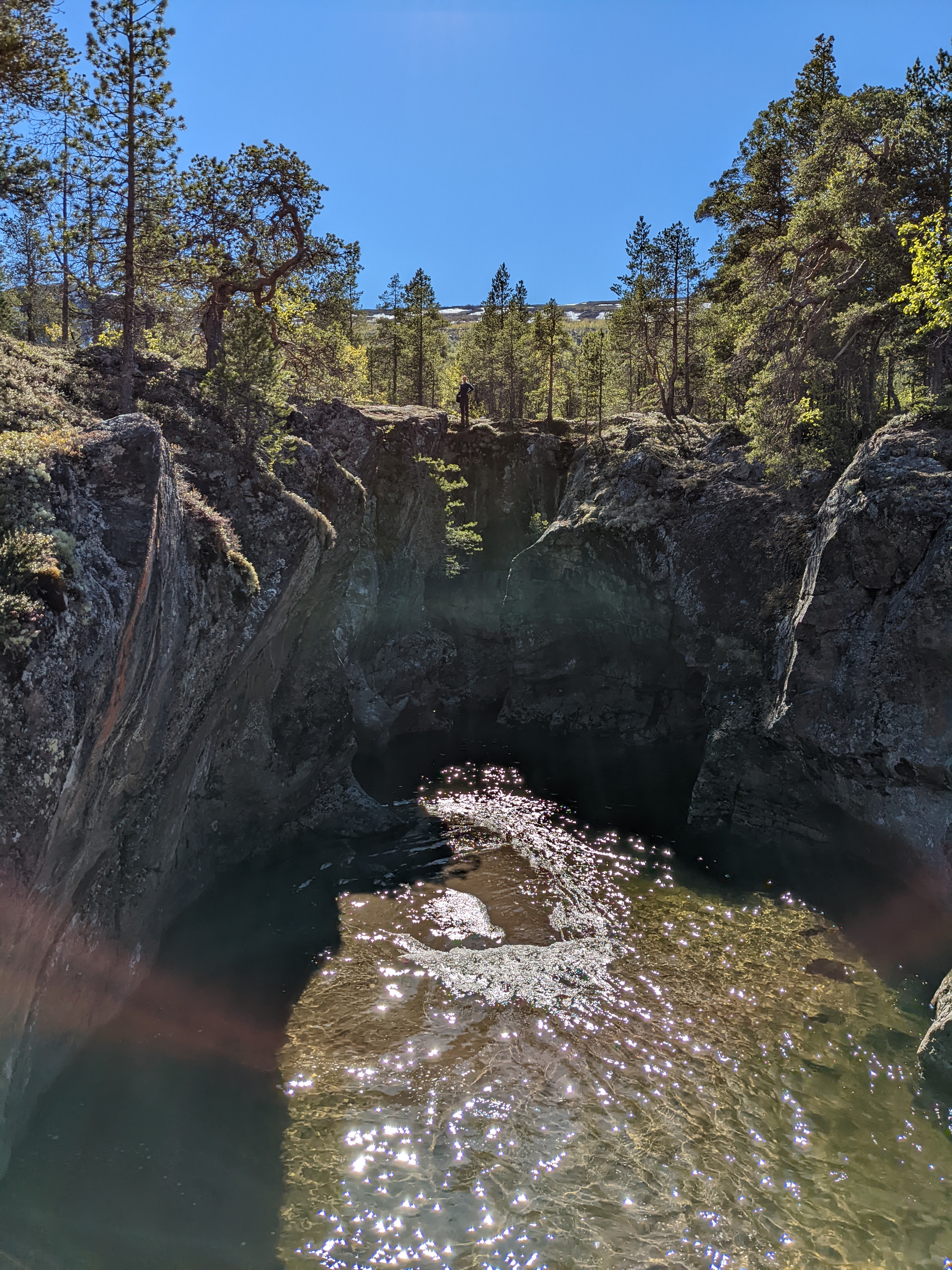 a calm pool in the canyon that was perfect for swimming in