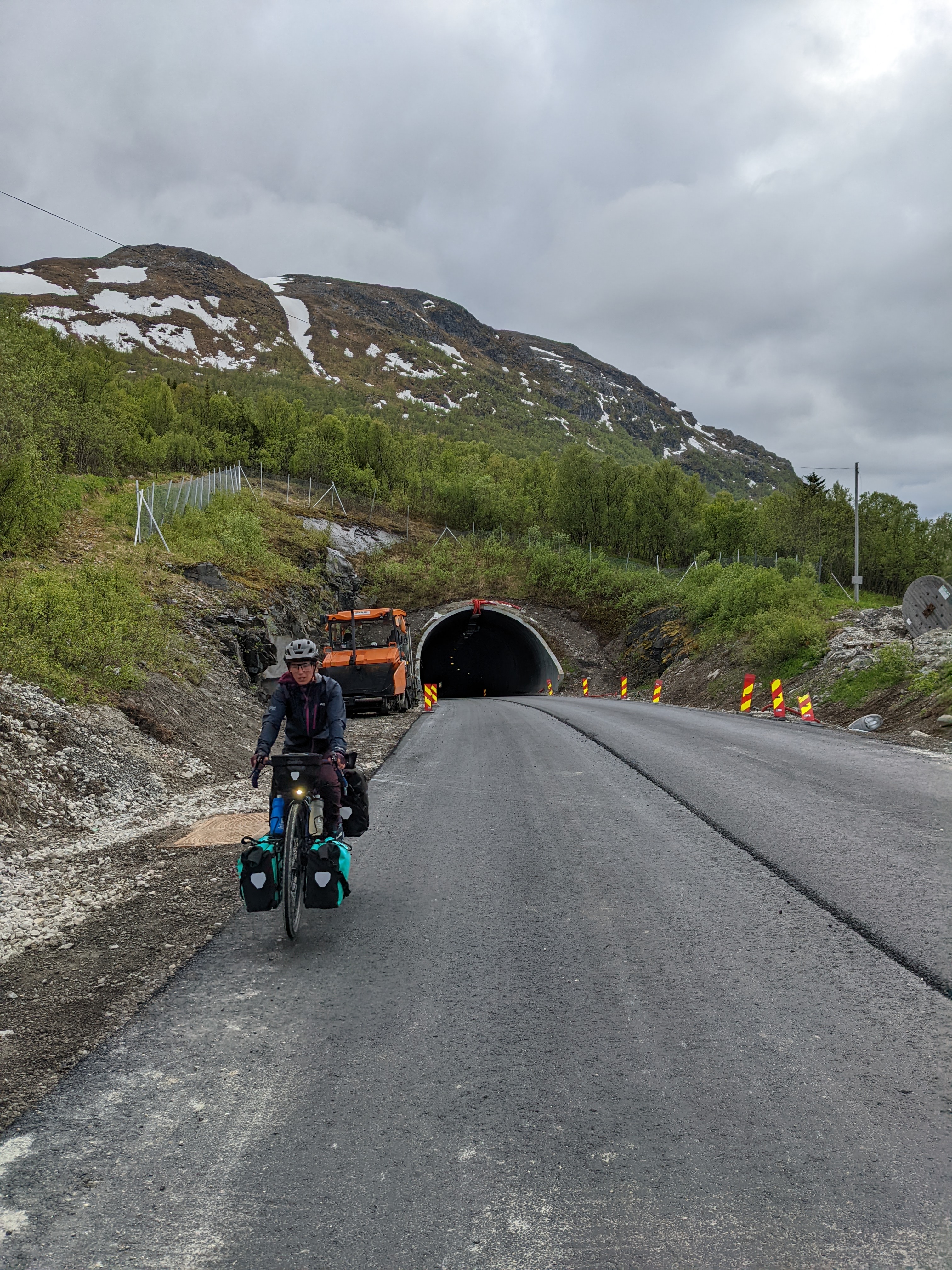 H riding from the exit of Marsund tunnel with a look of exhausion on her face